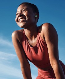 Lady smiles after exercising outdoors